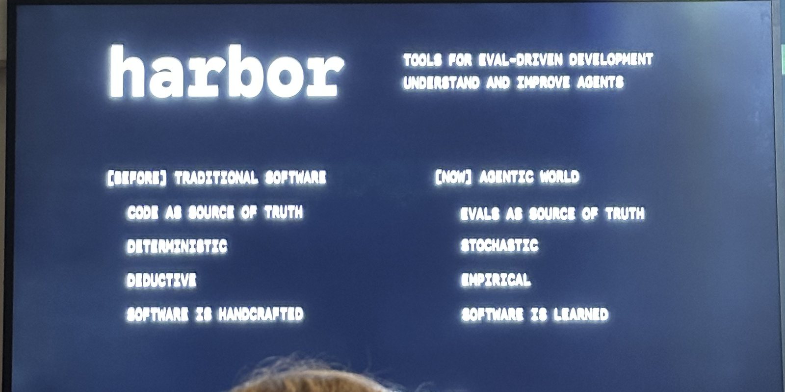 Harbor's framing slide: traditional software treats code as the source of truth; agentic software treats evals as the source of truth